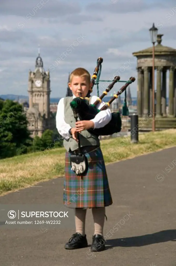 Portrait of a bagpiper playing a bagpipe, Edinburgh, Scotland