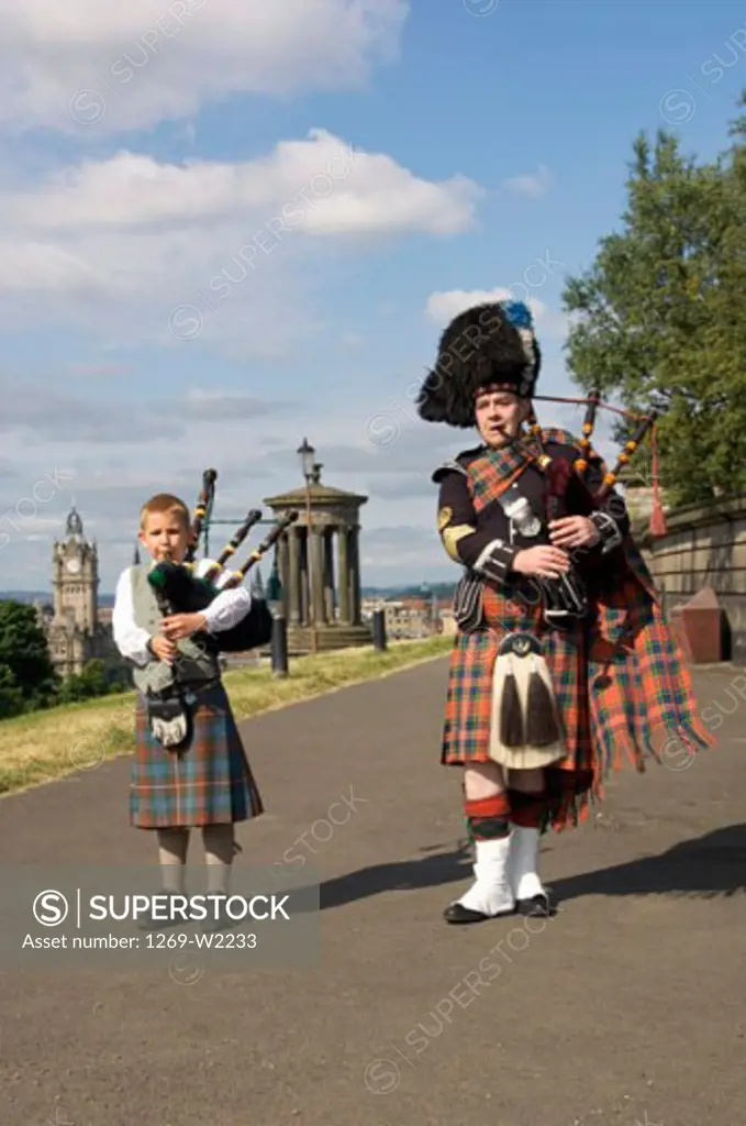 Two bagpipers playing bagpipes, Edinburgh, Scotland