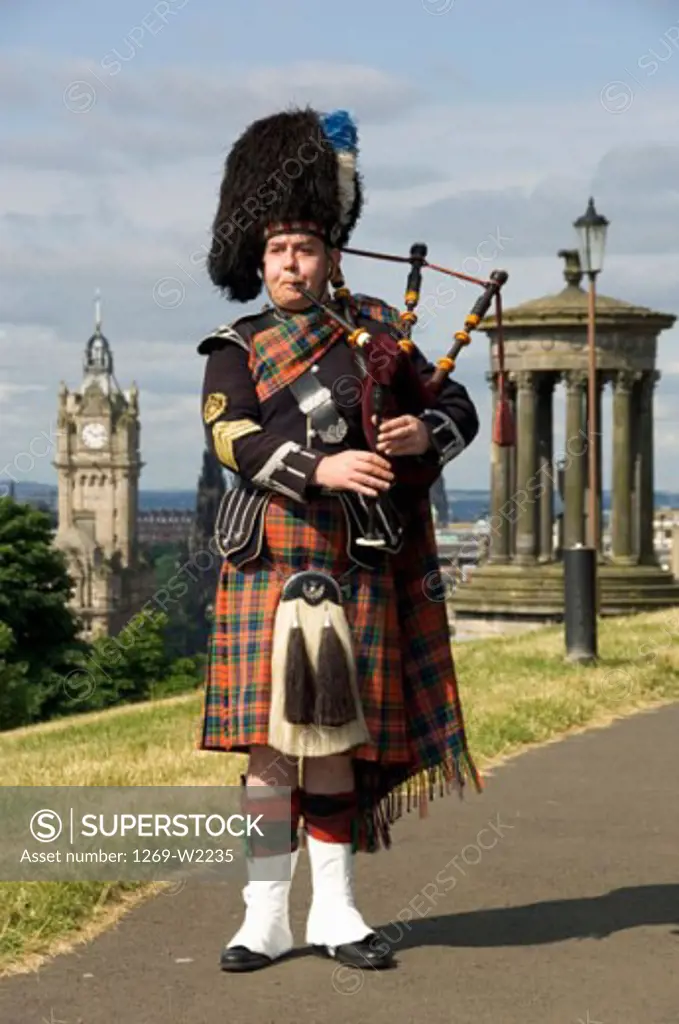 Bagpiper playing a bagpipe