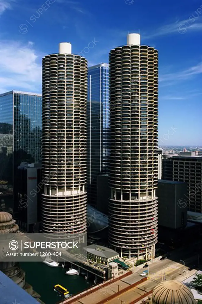 Skyscrapers in a city, Marina City, State Street, Chicago River, Chicago, Illinois, USA