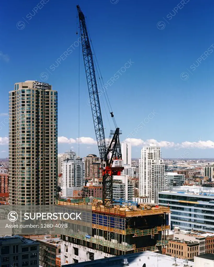 Crane at construction site in a city, 353 North Clark, 400 North Lasalle Condominiums, Chicago, Illinois, USA
