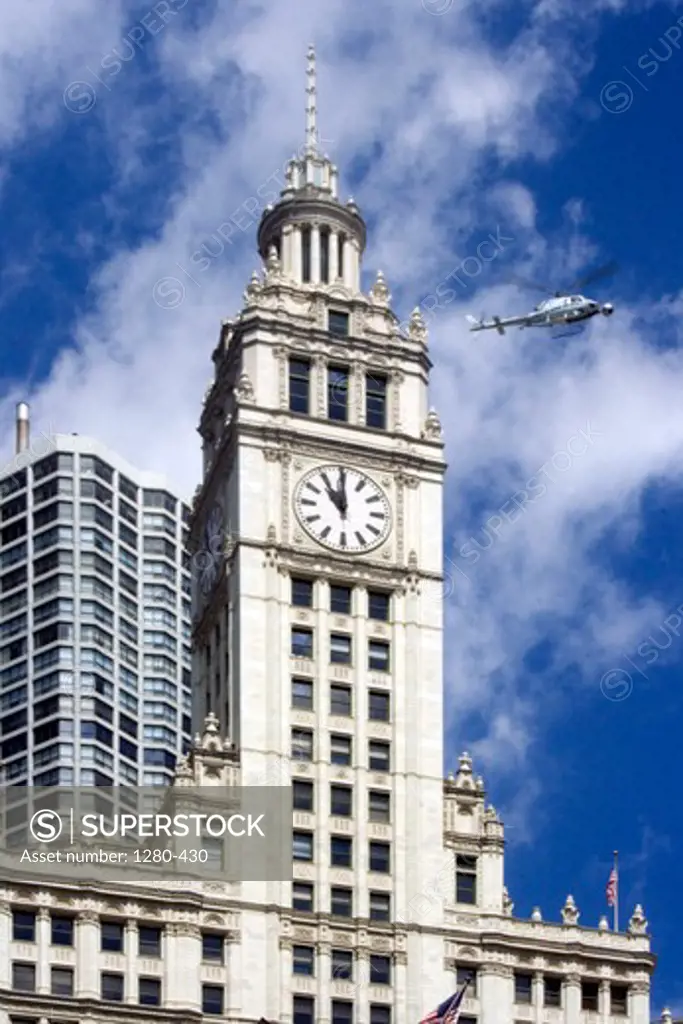 Low angle view of a clock tower, Wrigley Building, Michigan Avenue, Chicago, Illinois, USA