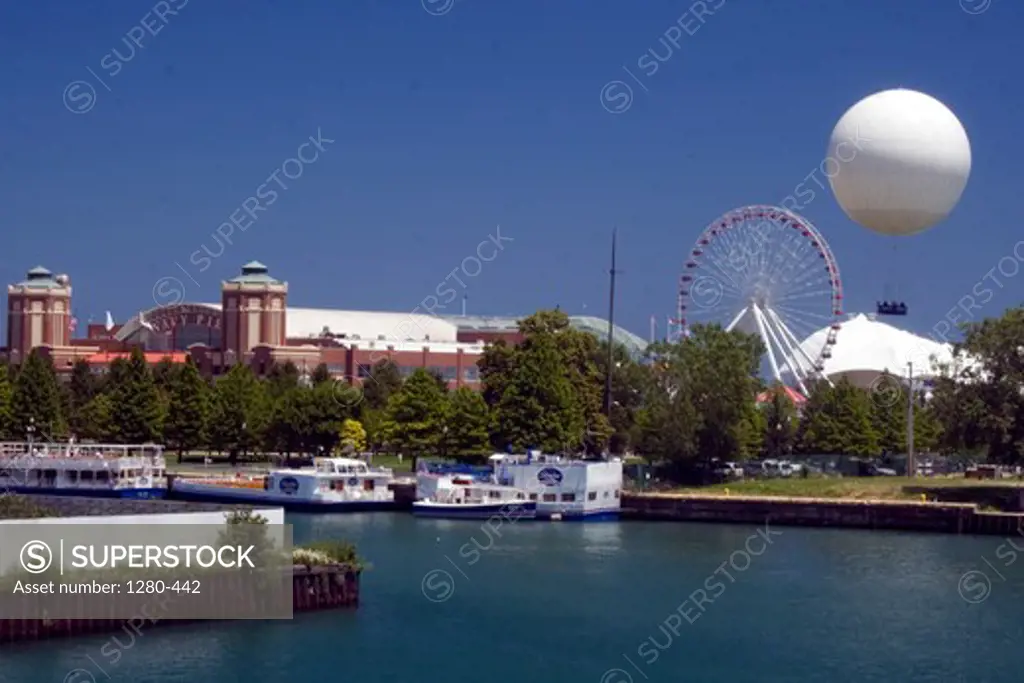 Hot air balloon near a ferris wheel, Navy Pier, Lake Michigan, Chicago, Illinois, USA