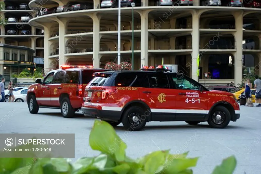 Chicago Fire Department vehicles used by the Paramedic Field Chief parked on the riverfront plaza, Marina Towers, 330 North Wabash, Chicago, Cook County, Illinois, USA