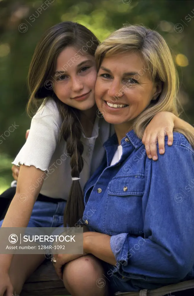 Portrait of a daughter smiling with her mother