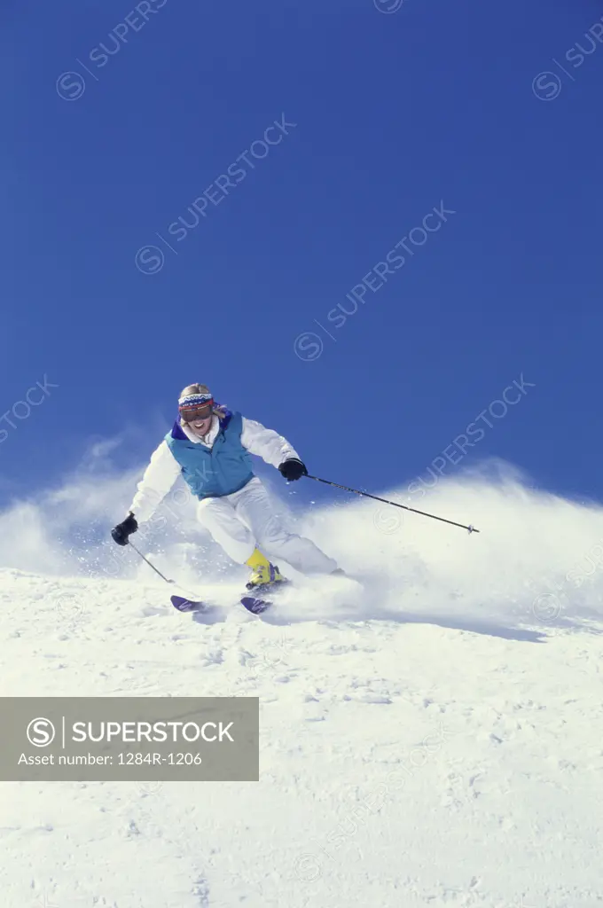 Young woman skiing, Bald Mountain, Sun Valley, Idaho, USA