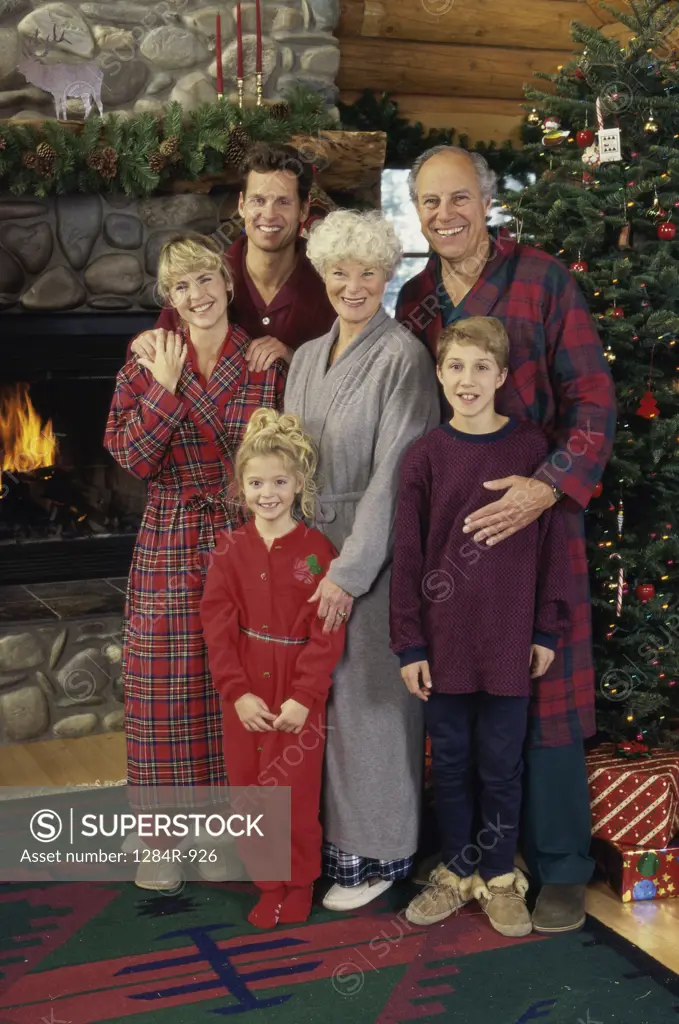 Portrait of a family near a Christmas tree
