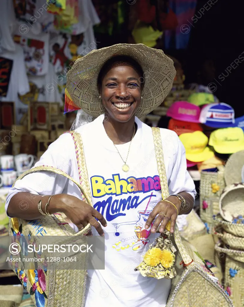 Portrait of a female vendor standing in a straw market, Nassau, Bahamas