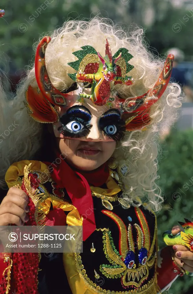 Close-up of a young woman wearing a devil costume, Devil's Carnival, Oruro, Bolivia