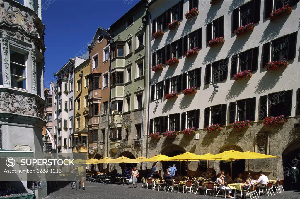 Group of people sitting at a sidewalk cafe, Innsbruck, Austria