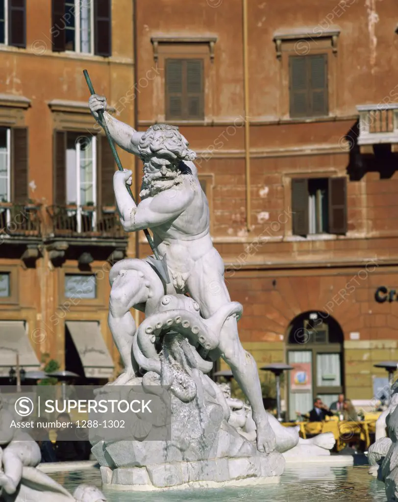 Fountain in front of a building, Fountain of the Four Rivers, Piazza Navona, Rome, Italy