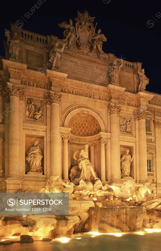 Fountain lit up at night, Trevi Fountain, Rome, Italy
