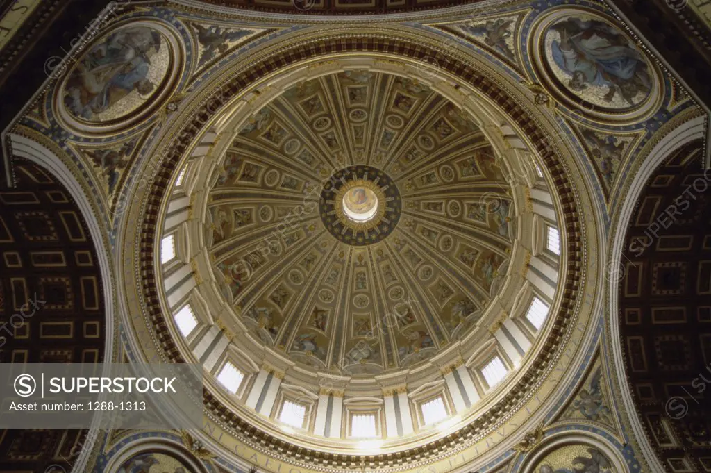 Low angle view of a domed shape ceiling, St. Peter's Basilica, Vatican City