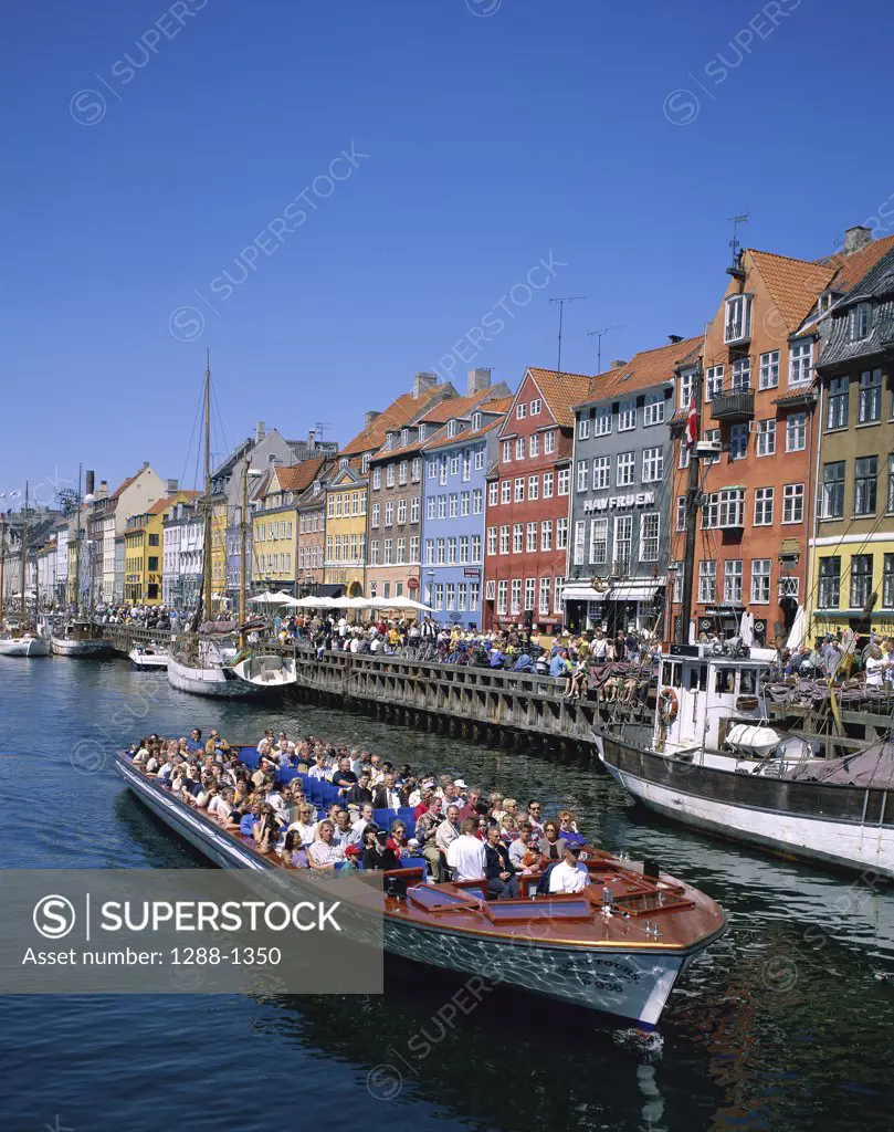 Tourists in a tourboat, Nyhavn, Copenhagen, Denmark