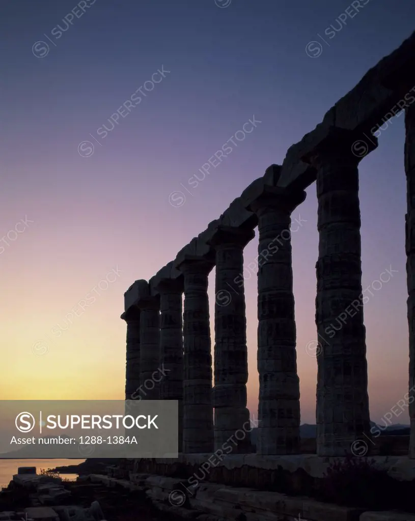 Silhouette of a temple at sunset, Temple of Poseidon, Sounion, Greece