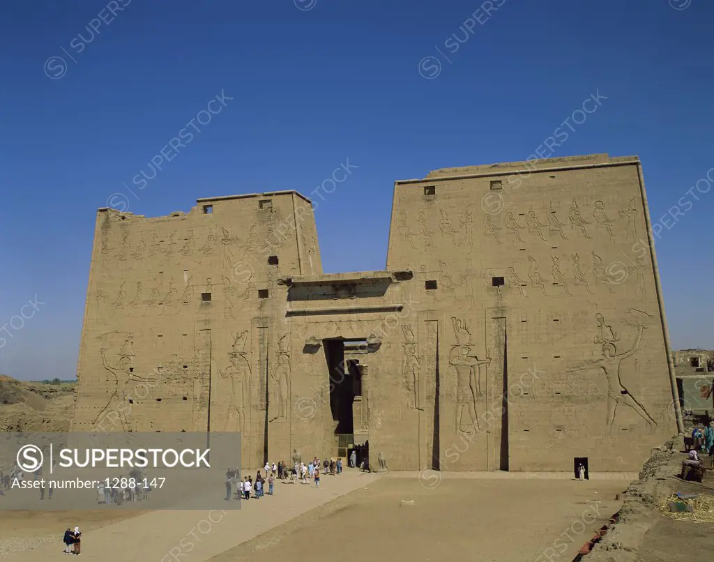 Tourists in a temple, Temple of Horus, Edfu, Egypt