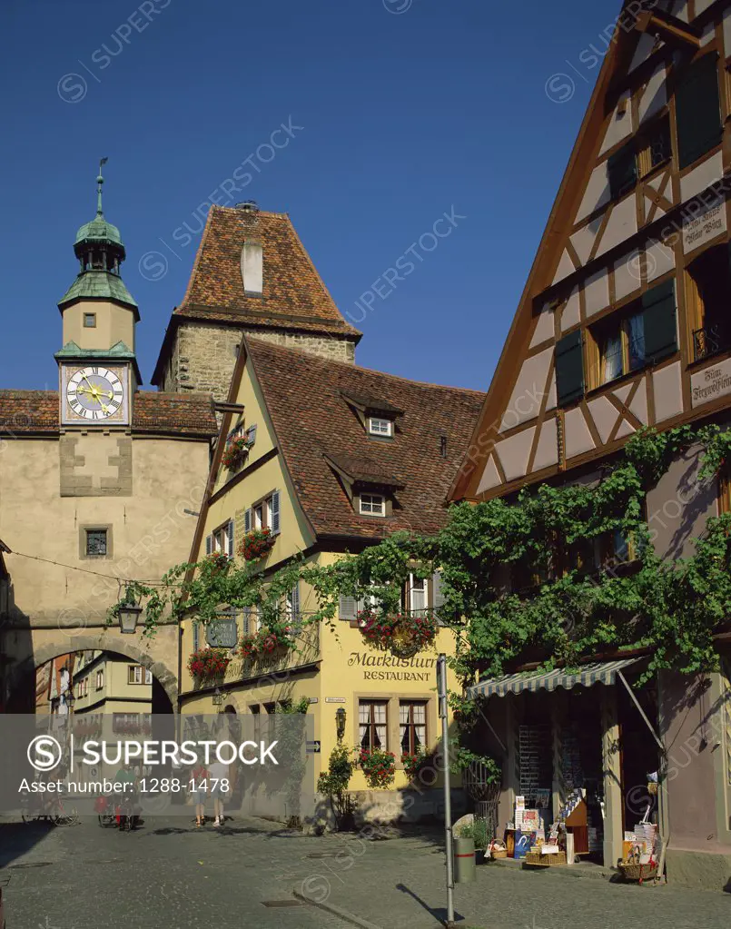 Buildings along a street in a town, Rothenburg ob der Tauber, Bavaria, Germany