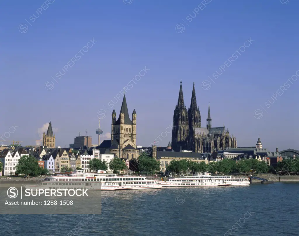 Cruise ships moored at a dock, Cologne, Germany