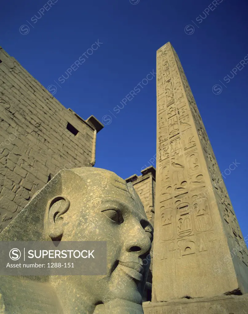 Low angle view of a statue, Ramses II, Temple of Luxor, Luxor, Egypt