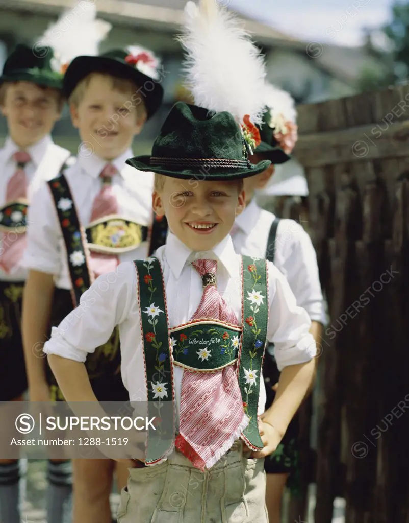 Portrait of boys smiling in a Bavarian festival, Bavaria, Germany