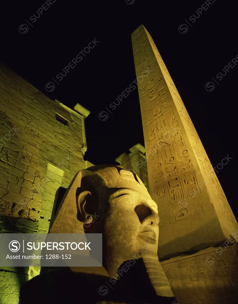 Low angle view of a statue at night, Temple of Luxor, Luxor, Egypt