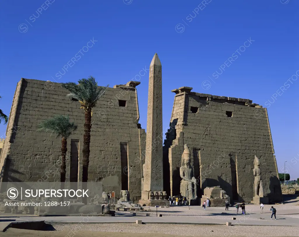 Tourists in an ancient temple, Temple of Luxor, Luxor, Egypt