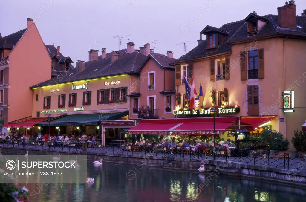 Group of people sitting at a sidewalk cafe, Annecy, France