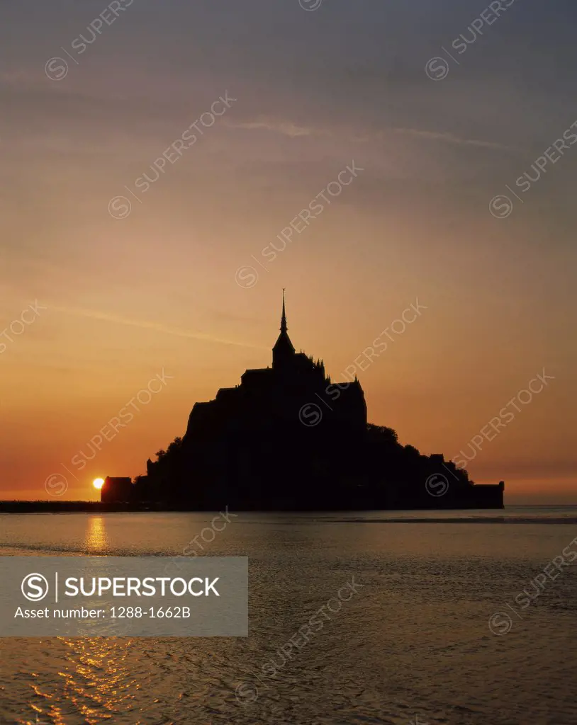 Silhouette of a abbey at sunset, Mont-Saint-Michel, Normandy, France