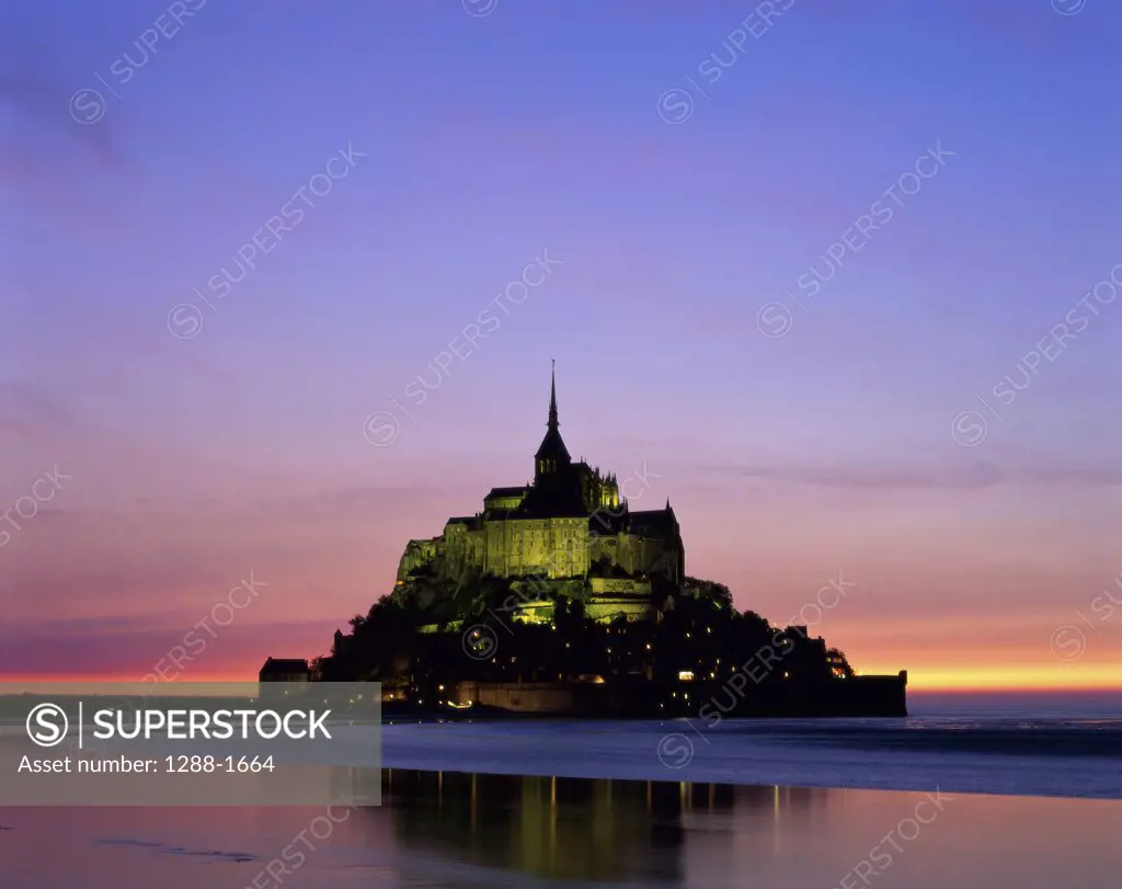 Silhouette of an abbey at dusk, Mont-Saint-Michel, Normandy, France