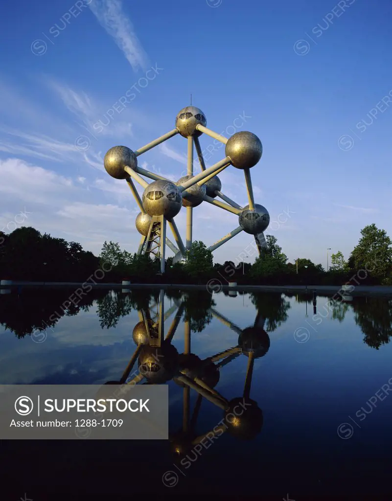 Reflection of a monument in water, Atomium, Brussels, Belgium