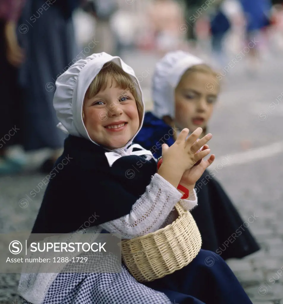 Two girls wearing traditional attire, Belgium