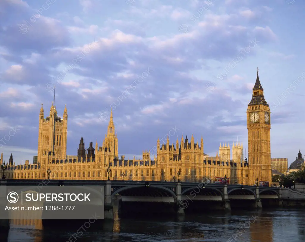 Bridge in front of a government building, Big Ben, Houses of Parliament, London, England