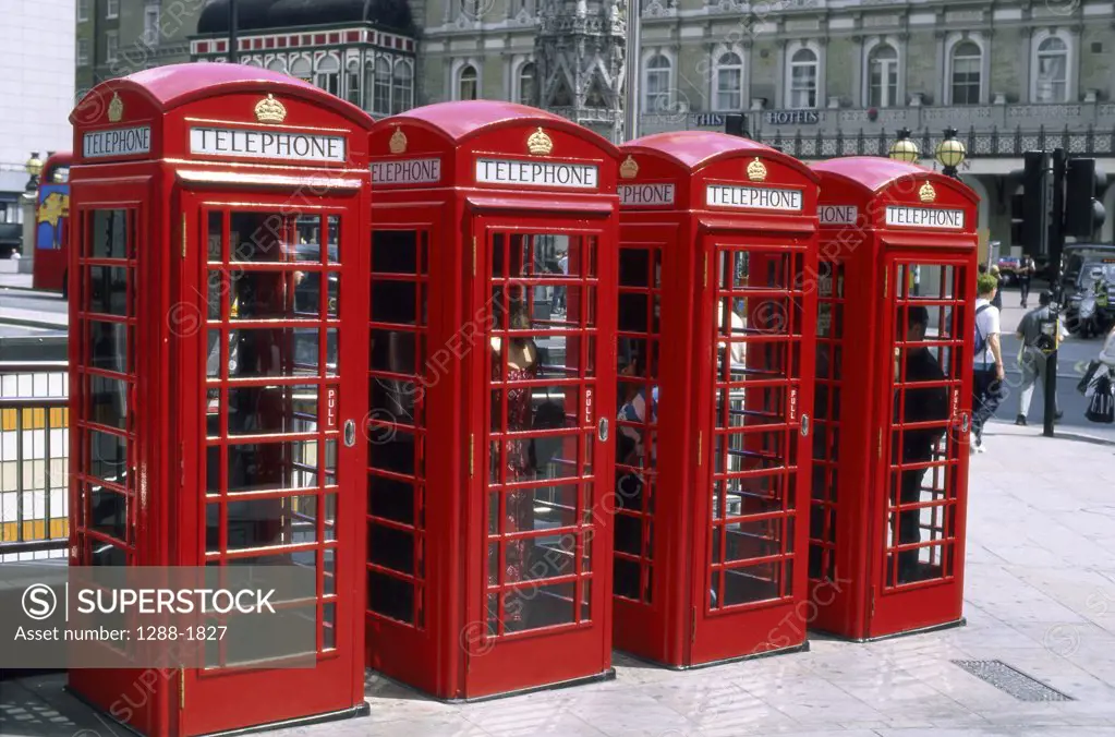 Telephone booths in a row, London, England