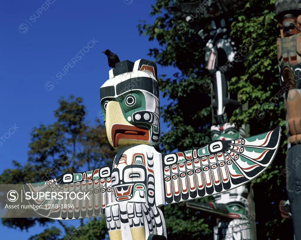 Low angle view of a totem pole, Stanley Park, Vancouver, British Columbia, Canada