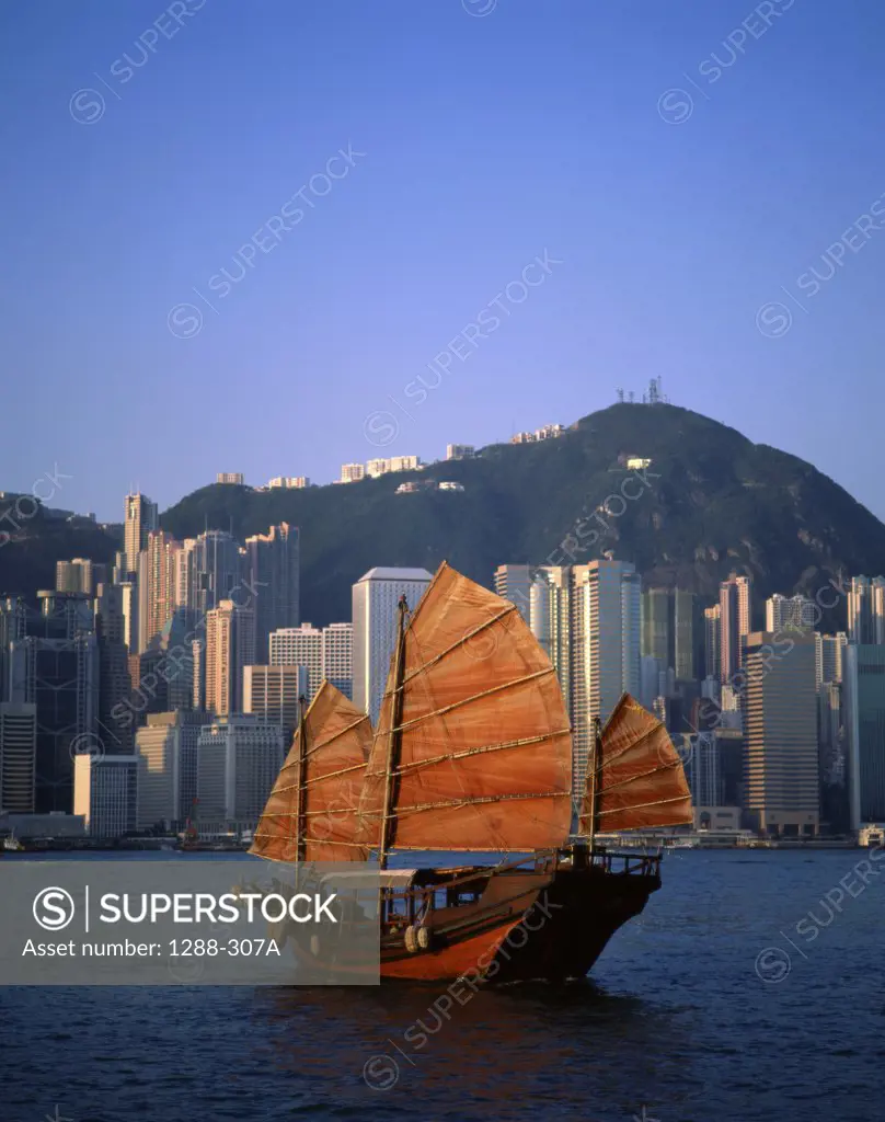 Chinese junk sailing in the sea, Hong Kong, China