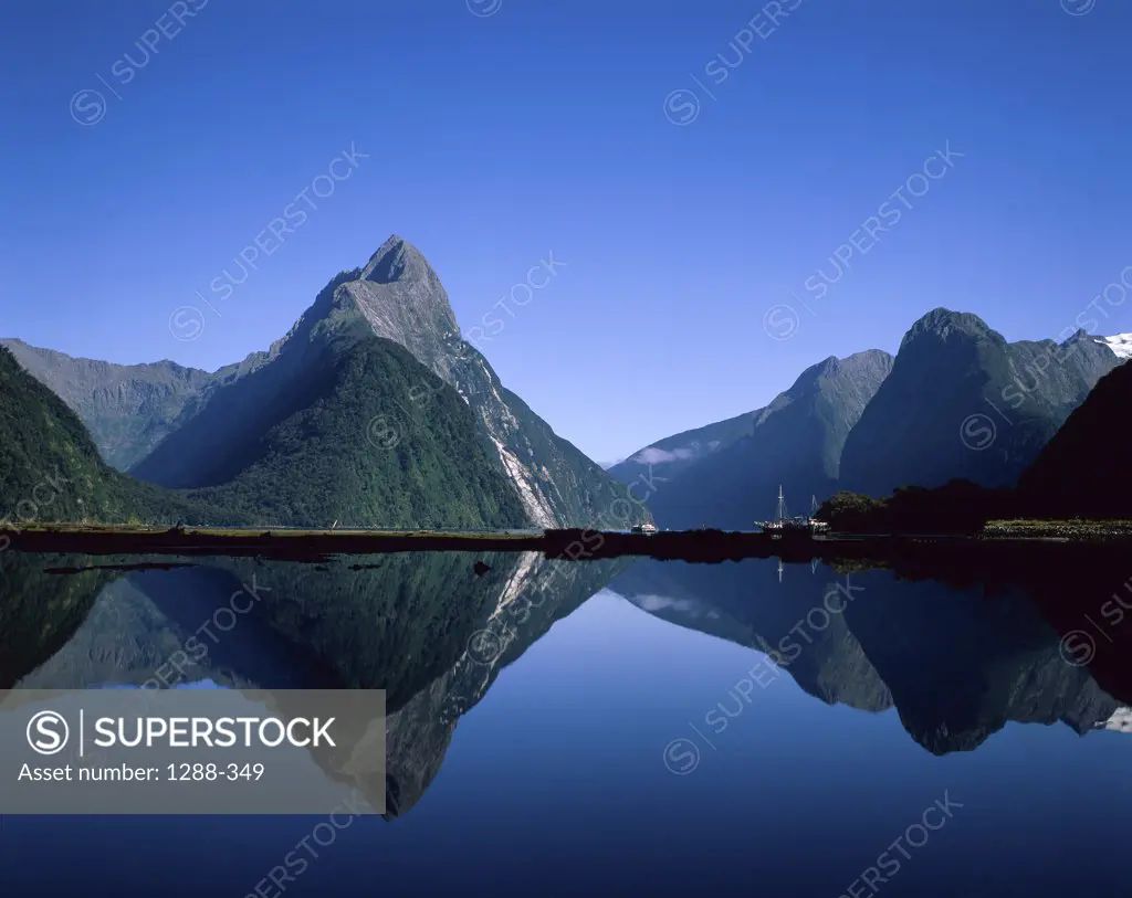 Reflection of mountains in water, Mitre Peak, Milford Sound, South Island, New Zealand