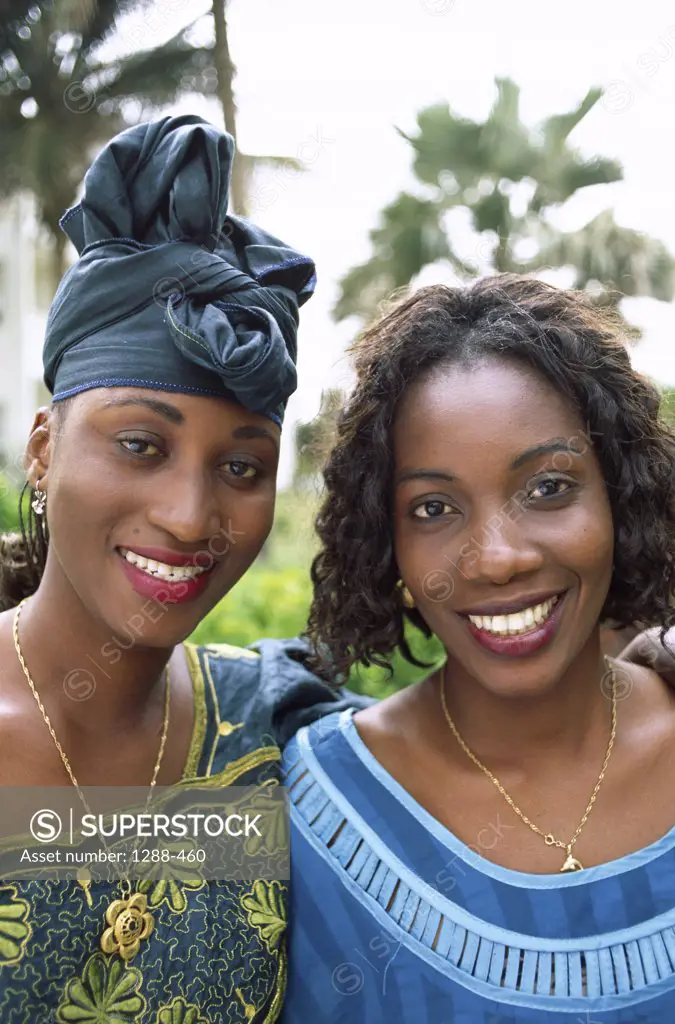 Portrait of two young women smiling, Banjul, Gambia
