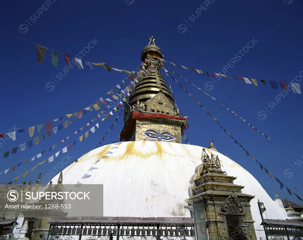 Low angle view of a stupa, Swayambhunath Stupa, Kathmandu, Nepal