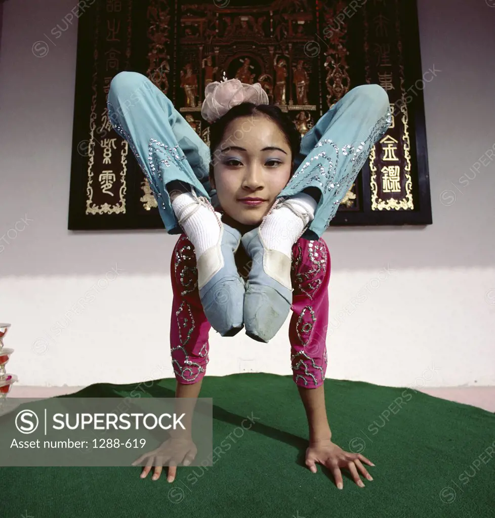 Girl performing gymnastics, Shanghai, China