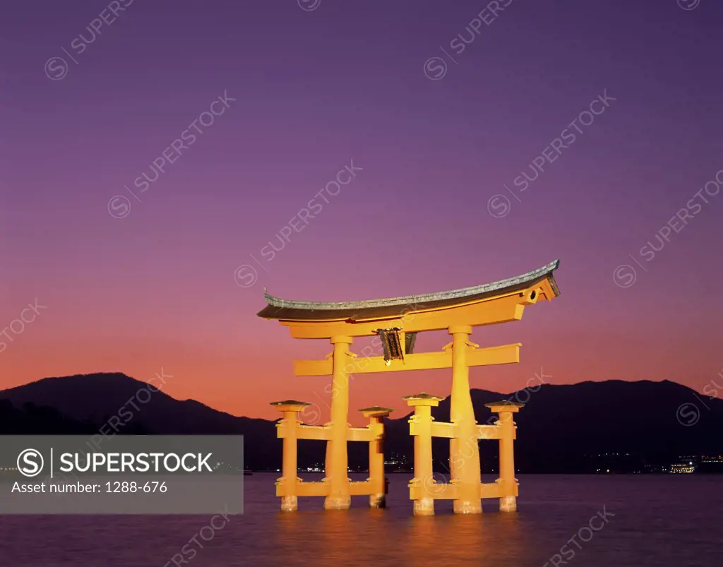Reflection of a gate in water, Torii Gate, Itsukushima Shrine, Miyajima, Japan