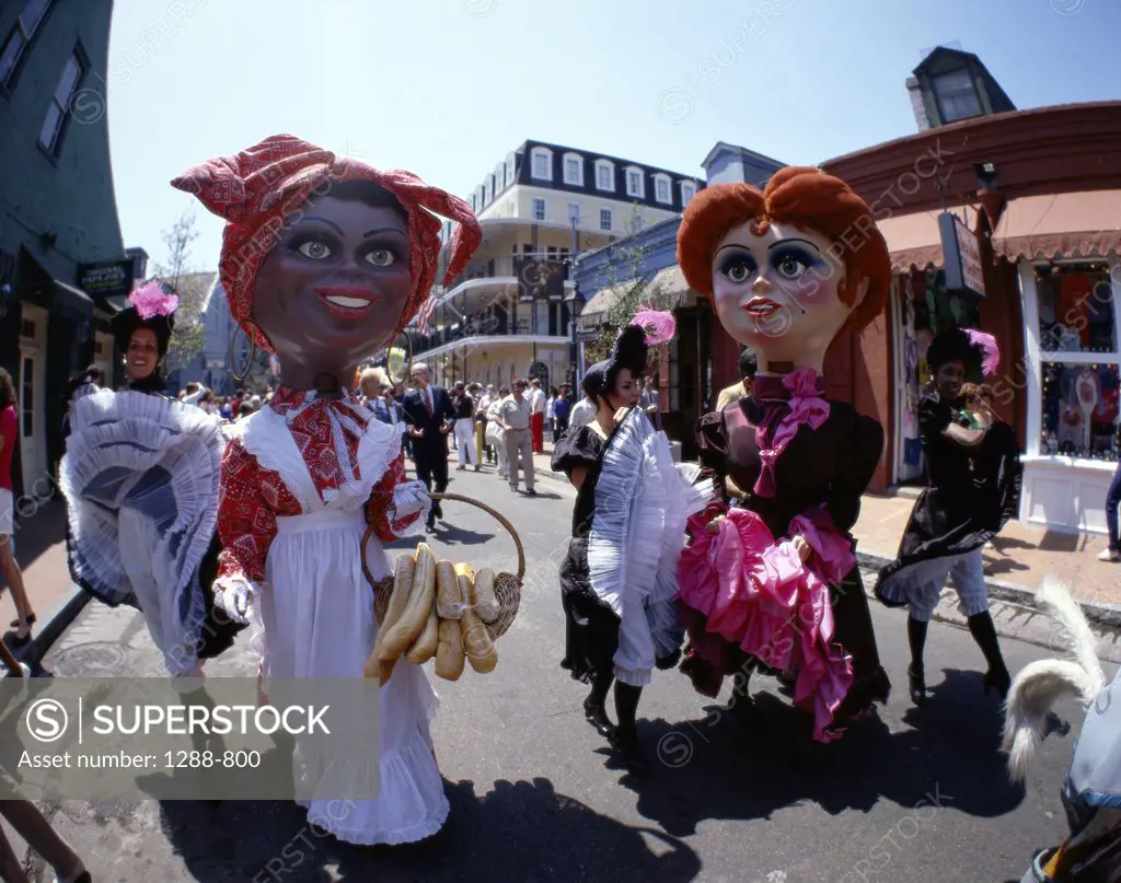 People wearing costumes in a parade, New Orleans, Louisiana, USA