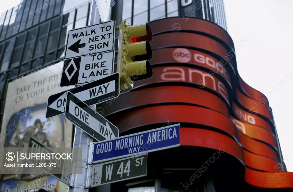 Close-up of directional signs on a traffic light, Times Square, New York City, New York, USA