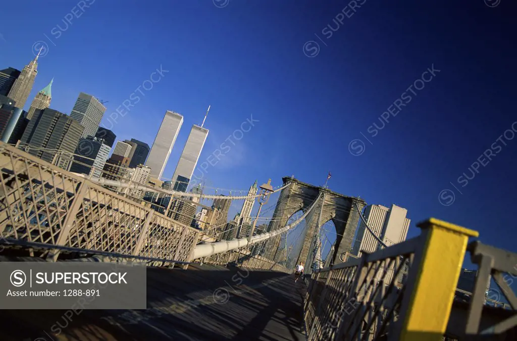 Person running on a bridge, Brooklyn Bridge, New York City, New York, USA