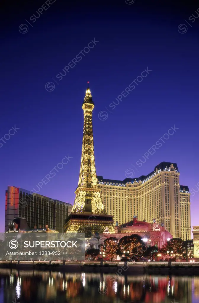 Hotel lit up at dusk, Paris Las Vegas Hotel and Casino, Las Vegas, Nevada, USA