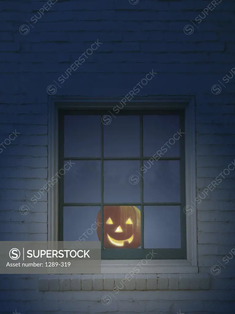 Jack o' lantern in a window