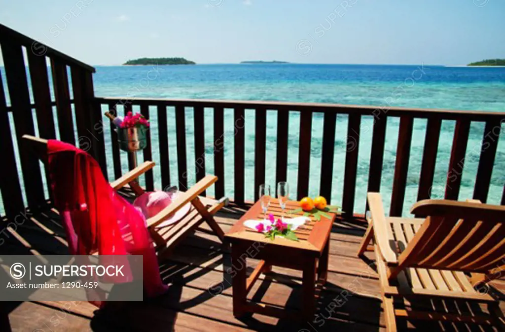 High angle view of two deck chairs, Reethi Beach Resort, Baa Atoll, Maldives 
