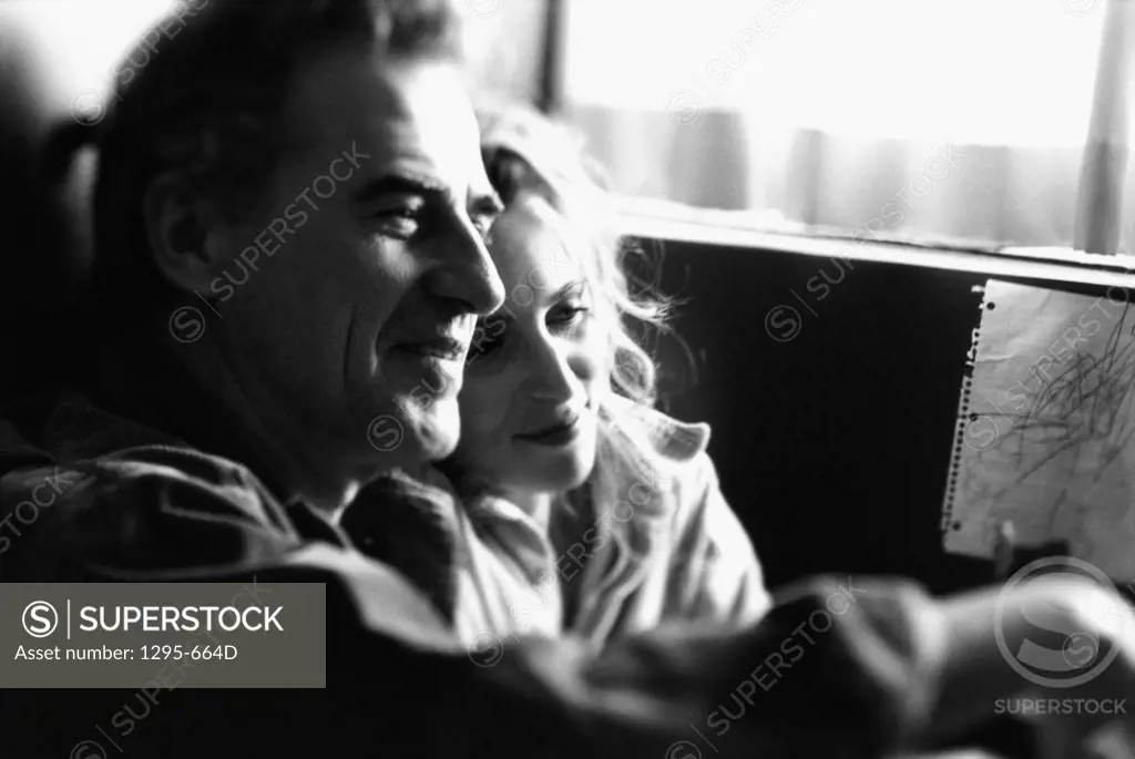 Side profile of a mid adult couple sitting together