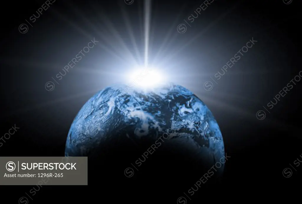 Light glowing behind the Earth