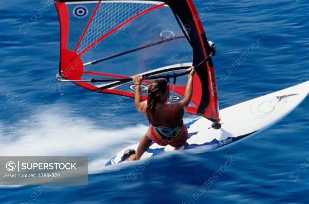 High angle view of a woman windsurfing