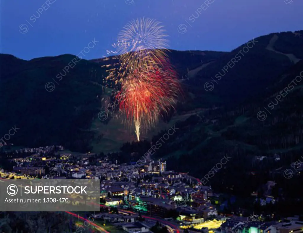 High angle view of a city lit up at dusk, Vail, Colorado, USA